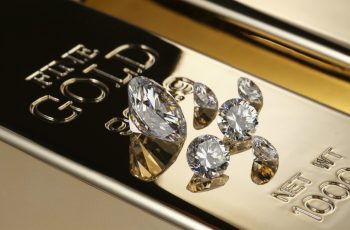 Gold bar and diamonds in a vault setting | Routex Logistics